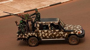 General sworn in as Guinea-Bissau leader in swift coup after disputed vote