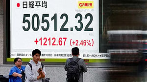 Asian markets pull back as stretched valuation fears jolt Wall St