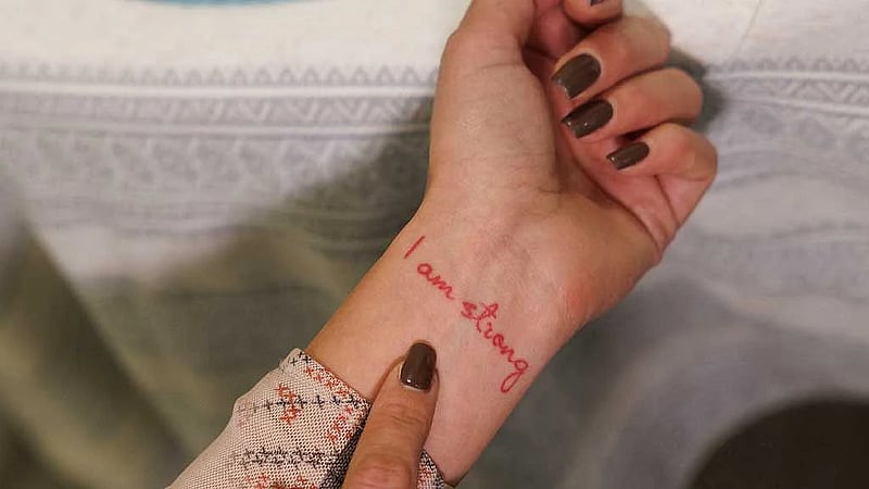 Ukrainians turn to tattoos to ease grief from war