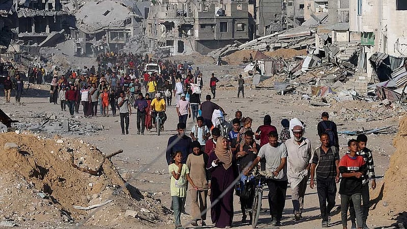 Gazans stream back home as Israel-Hamas ceasefire holds