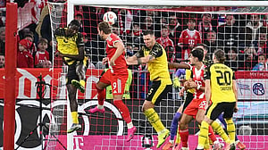 Kane is scorer and provider as Bayern snap Dortmund's unbeaten run with 2-1 win