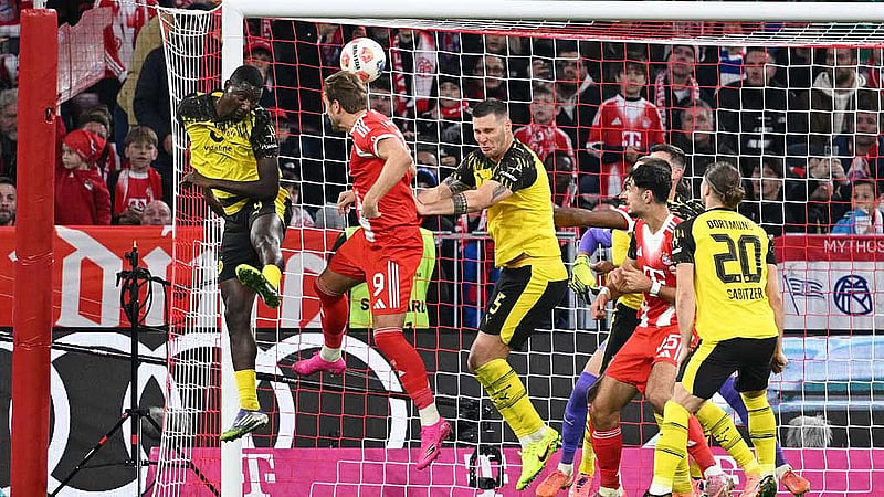 Kane is scorer and provider as Bayern snap Dortmund's unbeaten run with 2-1 win