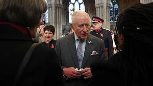Britain's King Charles heckled over brother Prince Andrew