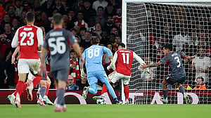 Martinelli on target as Arsenal battle past Olympiacos
