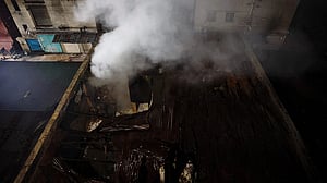 Locked door to roof, toxic gas blamed for deaths in Bangladesh factory fire