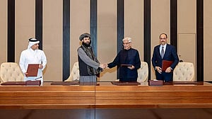 Afghanistan and Pakistan exchange fire as peace talks begin