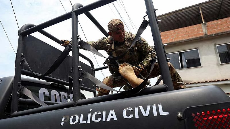 Rio police raids kill at least 132, corpses line street