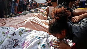 Corpses line Rio street after Brazil's deadliest operation against drug gangs
