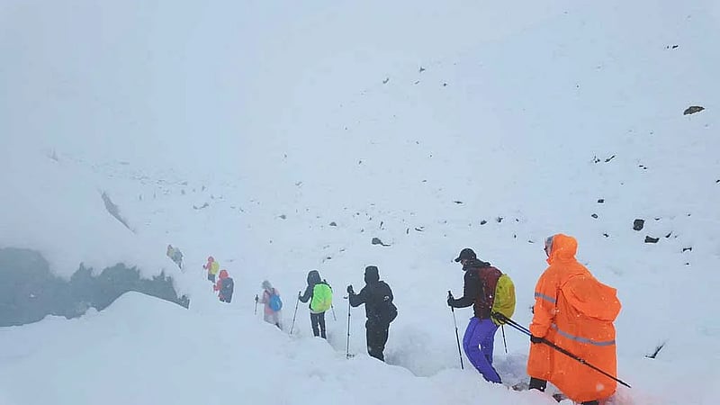 Rescuers race to evacuate stranded Everest hikers by Tuesday, source says