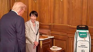 With golfing gifts, Japan PM invokes Abe's legacy to forge Trump bond