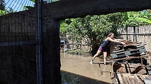 Waters recede in Bali after floods kill 18 people, with two still missing