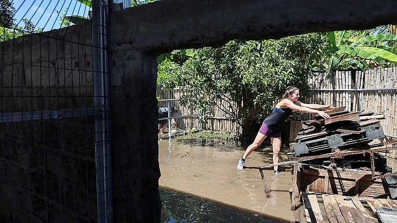 Waters recede in Bali after floods kill 18 people, with two still missing
