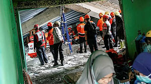 Indonesia rescuers hunt for 38 feared trapped after school collapse kills 3