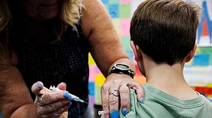 US vaccine advisors abandon broad COVID shot support