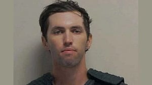 Suspected gunman Robinson wrote note threatening Kirk, tied to scene by DNA, FBI director