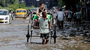 At least 12 dead as record rain floods India's Kolkata
