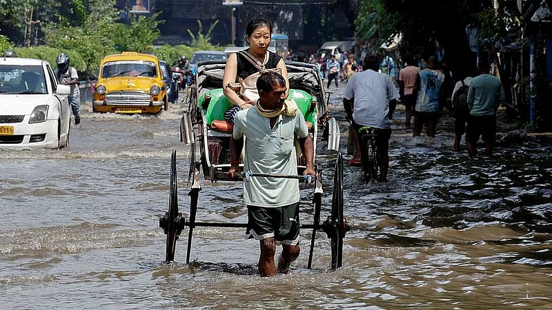 At least 12 dead as record rain floods India's Kolkata