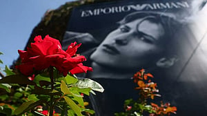 A lone red rose outside Armani as Milan mourns its 'king' of fashion