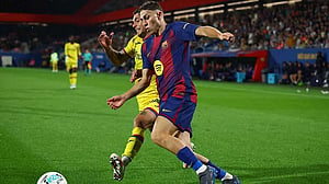 Barcelona's Lopez out for three weeks with muscle injury