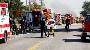 Shooter kills at least four, wounds eight at Michigan church