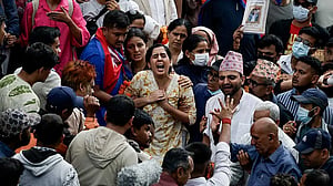 Weeping Nepalis hold funerals for those killed in deadly anti-graft protests