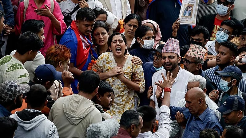 Weeping Nepalis hold funerals for those killed in deadly anti-graft protests