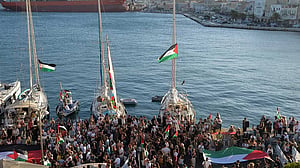 Italy urges Gaza flotilla to hand over aid after drone attack