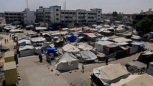 Israeli military tells Gaza City residents to leave, bombs high-rise tower