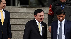 Thai parliament to vote on new PM, as Thaksin jets off amid chaos