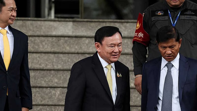 Thai parliament to vote on new PM, as Thaksin jets off amid chaos