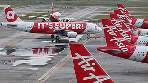 Asian airlines trim schedules and carry extra fuel as supplies tighten