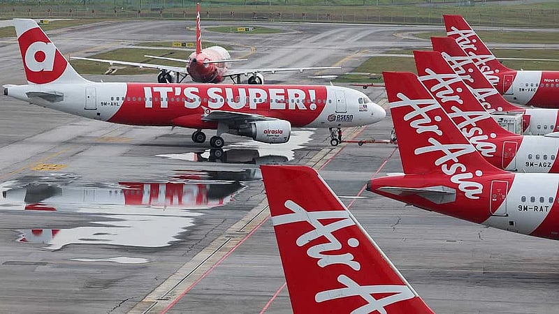 Asian airlines trim schedules and carry extra fuel as supplies tighten
