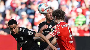 Olise and Kane lead Bayern comeback from three goals down in 4-3 win at Mainz
