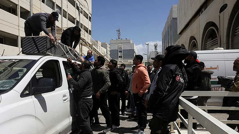 At Beirut hospital, grieving families identify mangled bodies after Israeli strikes