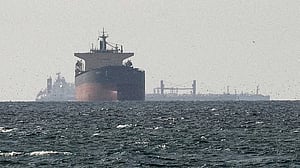 Iran Navy tells ships Strait of Hormuz shut again, two vessels report gunfire