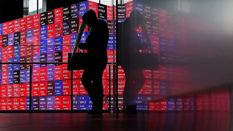 Share futures wobble, dollar gains as Iran talks teeter