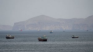 Iran seizes ships in Strait of Hormuz after US calls off renewed attacks
