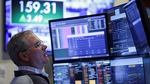 Tech boosts US stocks to record close, oil dips on signs of Iran peace progress