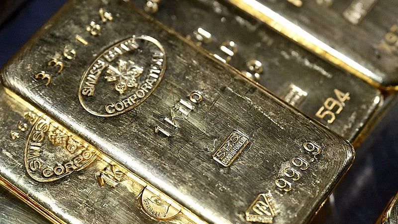 Gold gains over 1 percent on soft US data, Trump's fresh tariff move