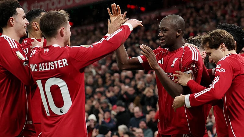 Slot praises Konate for swift return after father's death amid defensive crisis