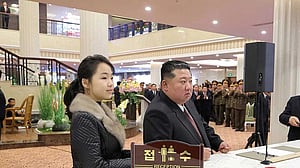 North Korea's Kim positioning daughter as successor, Seoul spy agency briefing says