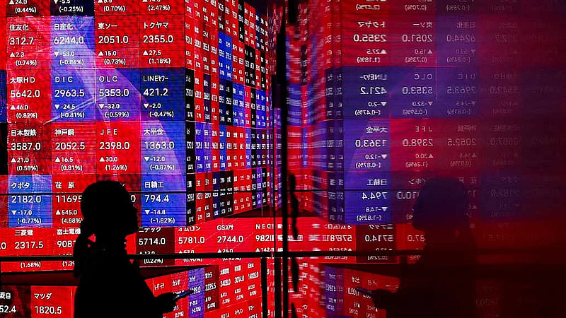 Wall St futures, dollar drop amid US tariff tumult