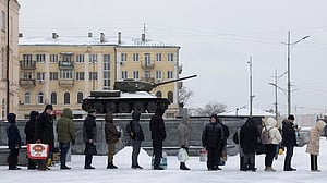 Ukraine talks set for next week as cold sweeps country