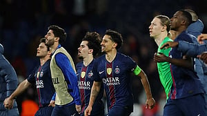 PSG see off late Monaco surge to advance in Champions League