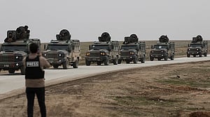 Syrian state forces deploy in Kurdish-run city under ceasefire deal