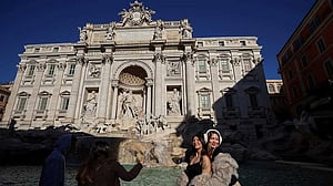 Rome introduces Trevi Fountain access fee to curb coin-tossing crowds