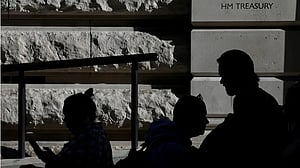 UK Treasury offers up to 100,000 pounds exit packages to cut hundreds of jobs, FT reports