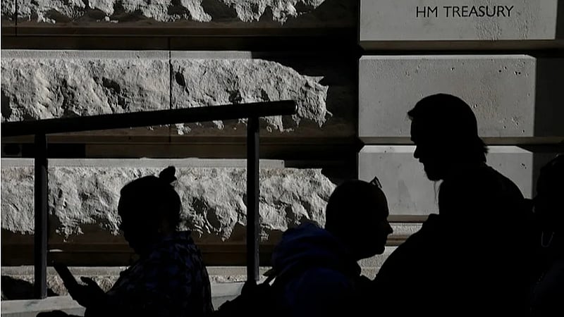 UK Treasury offers up to 100,000 pounds exit packages to cut hundreds of jobs, FT reports