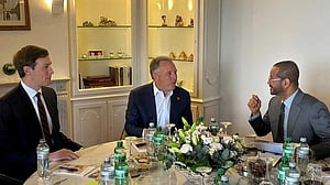 US envoys juggle two crisis talks, raising questions about prospects for success