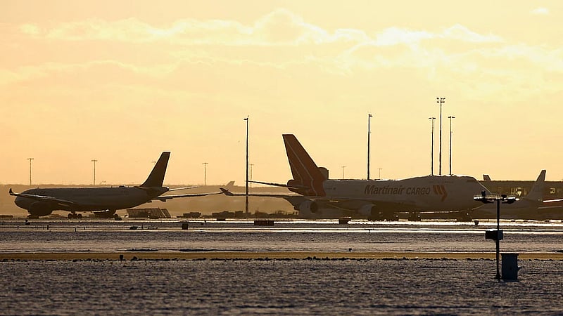 Snowstorm sees travellers bed down in Amsterdam airport, Parisians take to skis
